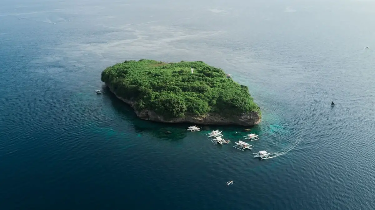 Pescador Island is one of the top Cebu tourist spots for marine enthusiasts